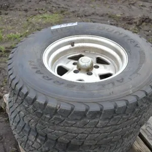 HIGH COUNTRY - ruck tires on rims - 10:50 R15 LT