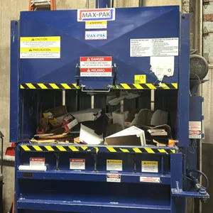 Max-Pak MP60HD15 commercial vertical cardboard baler. Features a left swinging door, 15 HP motor, and control panel. S/N: 071913863. Electrical: 460V,