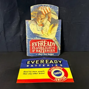 PAIR OF VINTAGE HOLIDAY-THEMED EVEREADY BATTERY & FLASHLIGHT ADVERTISING CARDBOARD SIGNS