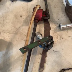 Rotary hand pump featuring a Bonar-Hypro 3151 pump head, attached hose, handle, and connecting hardw