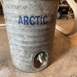 Arctic Boy water cooler, 3-gallon capacity, made by the Schlueter Mfg. Co., St. Louis, MO. Construct