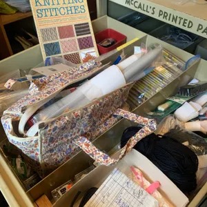Comprehensive Knitting, Sewing, and Crafting Lot With Tools, Yarn, and Guidebook