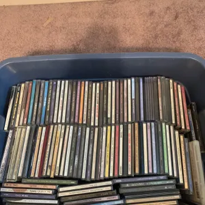 Over 100 Music CDs Featuring Various Artists and Genres