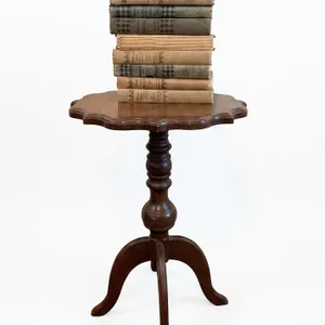 8 Decorative Hardcover Books (1933) with Round Wooden Pedestal Table