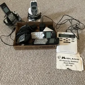 Box lot of phones and midland weather radio