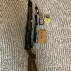 Crosman pellet/bb gun with scope, some pellets