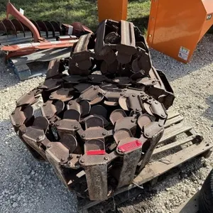 Over tire steel skid steer tracks.