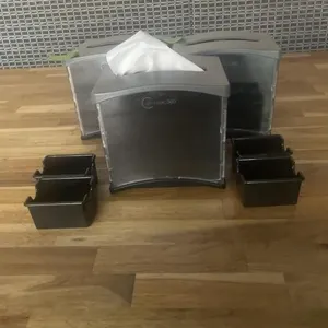 Three napkin containers and fourcondiment holder