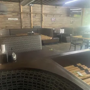 4- 4 seating booth, one large U-shaped booth