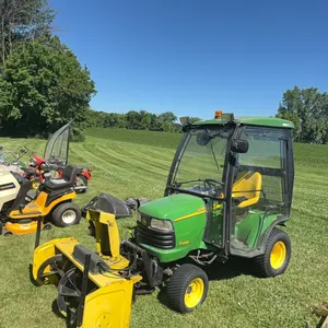 John Deere X585 Riding Lawn Mower, 4x4, Fuel Injected Gas Engine, 54" Deck, 47” Front Mount Snowblower, 3 Point, PTO, Cozy Cab, 796 Hours, year unknow