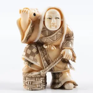 IVORY CARVED FLIP FACE FISHERMAN WITH CARP 2"
