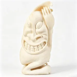 CECILIE KLEIST TUPILAK CARVED TWO-FACE FIGURE
