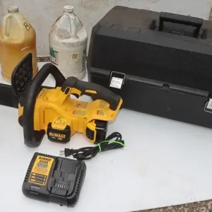 Dewalt Chainsaw Mo. BCCS630 w/ Battery Charger &