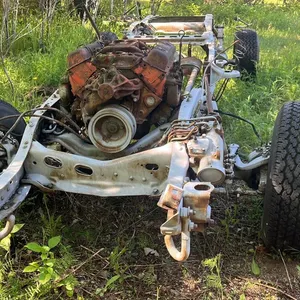 OFFSITE - 4 wheel drive Blazer or Yukon frame with motor, transmission and Transfer case.
