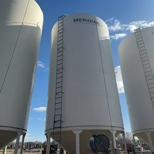 Meridian 5000 bushel hopper bin with fan, this bin is designed for fertalizer, however it has never had fertilizer in it. Grain only. Excellent condit
