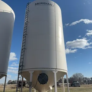 Meridian 5000 bushel hopper bin with fan, this bin is designed for fertilizer, however it has never had fertilizer in it. Grain only. Excellent shape.