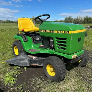 JOHN DEERE STX38 RIDE ON LAWN MOWER W/ 13HP OHV ENG., 38" DECK S/N M00STXJ302651