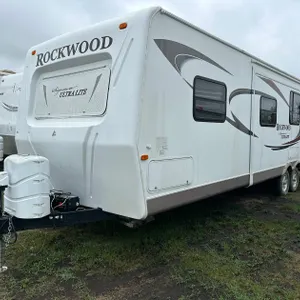 2010 FOREST RIVER SIGNATURE ULTRA LITE 8317KDSS 31FT TRAVEL TRAILER, BUNKHOUSE, 2-DOORS, SLIDE, FRONT QUEEN, AWNING (NEEDS REPAIR), S/N 4X4TRLH2XB1836
