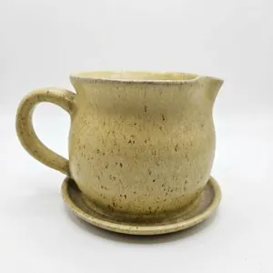 Pottery and Brass Boot Lot