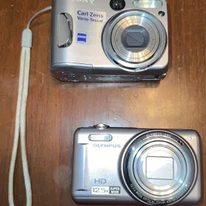 Sony Cyber-shot and Olympus VR-320 Cameras