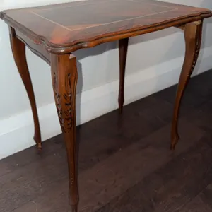Wood Side Table with Inlaid Top and Carved Sk