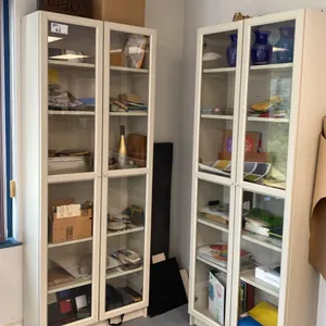 (2) 7FT TALL WHITE GLASS FRONT CABINETS AND CONTENTS