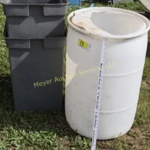 2 trash cans & white barrel