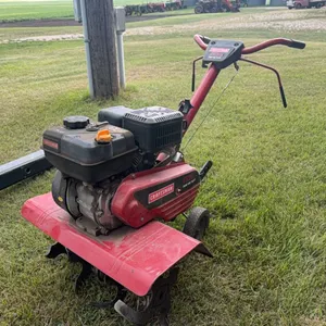 Front tine tiller, later newer model, gas engine