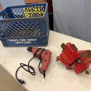 Bench vise, electric drill