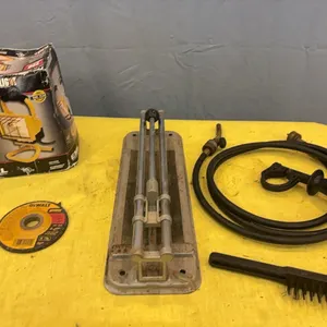 Work- light, tile cutter, metal grinding wheel, and flow through cleaning brush