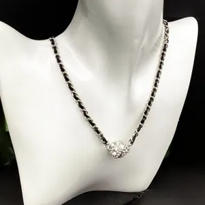 Woven charm neckpiece