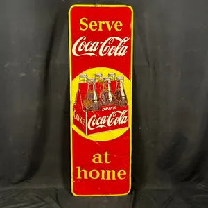 VINTAGE "SERVE COCA-COLA AT HOME" EMBOSSED TIN SIGN FEATURING THE SIX-BOTTLE CARTON GRAPHIC 4FT5 X 1FT5