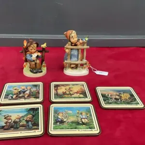 (2) HUMMEL FIGURINES & (5) COASTERS