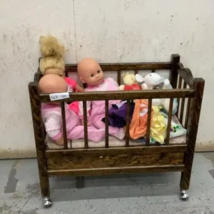 ROLLING DOLL CRIB W/ (3) DOLLS