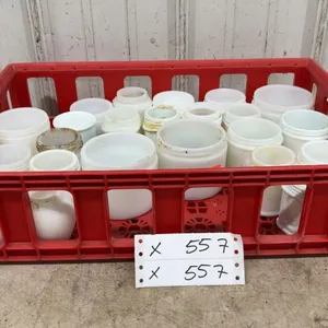 Collection of Vintage Milk Glass Jars Including Pond's, in Red Plastic Crate