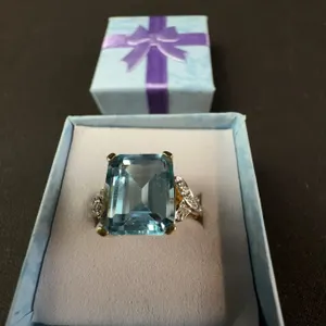Gold Ring with Large Blue Gemstone