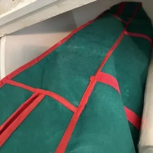 Christmas wrapping paper bundle with green bag