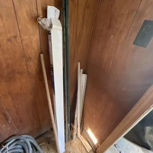 Two way traverse rod, fencepost, floor and carpet