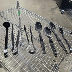 Shelf of Assorted Catering Utensils