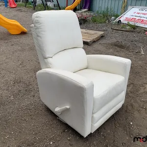 White Leather Lounging Chair
 UNRESERVED