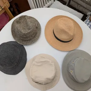 Five Assorted Hats Including Straw, Bucket, and Tweed Styles