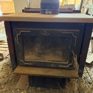 Ostrum Wood Stove with Glass Door and Chimney Pipe