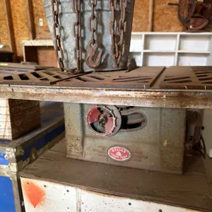 Beaver Table Saw with Bucket of Chains