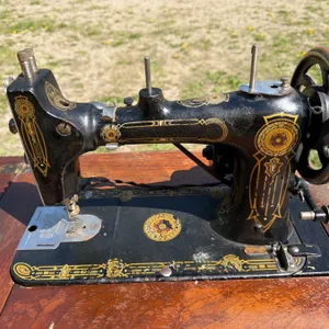 Vintage Sewing Machine with Wooden Cabinet