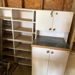 White Wood Shelves and Cabinet with Countertop