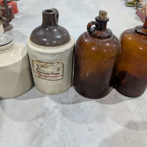 (2) Brown Glass Vintage Jugs and (2) Vintage crocks