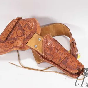 Modern hand tooled leather gun belt, total belt length 46 1/2". Fitted with cartridge loops, appear 