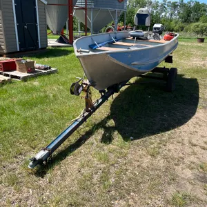 EDSON BOAT & 1994 HOMEBUILT TRAILER