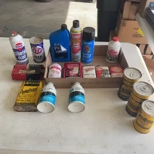 Automotive Fluids Oil Cans and Champion Spark Plugs