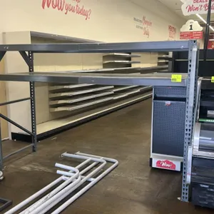 108"L of metal teardrop pallet racking. Features upright frames, cross beams, and decking. Dimensions: 108"L x 37"D x 73"H. Background items not inclu